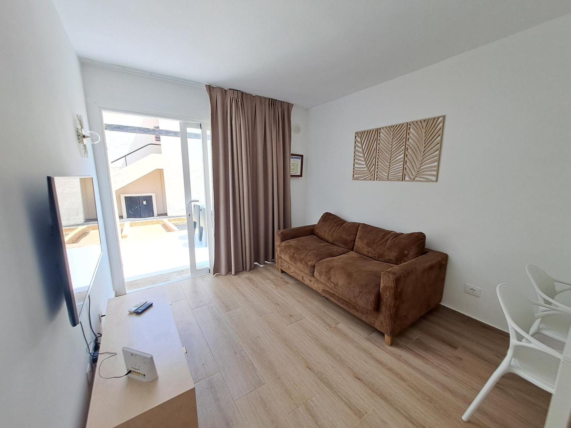 Homeforguest Apartamento Con Terraza Y Piscina En Corralejo Bagian luar foto